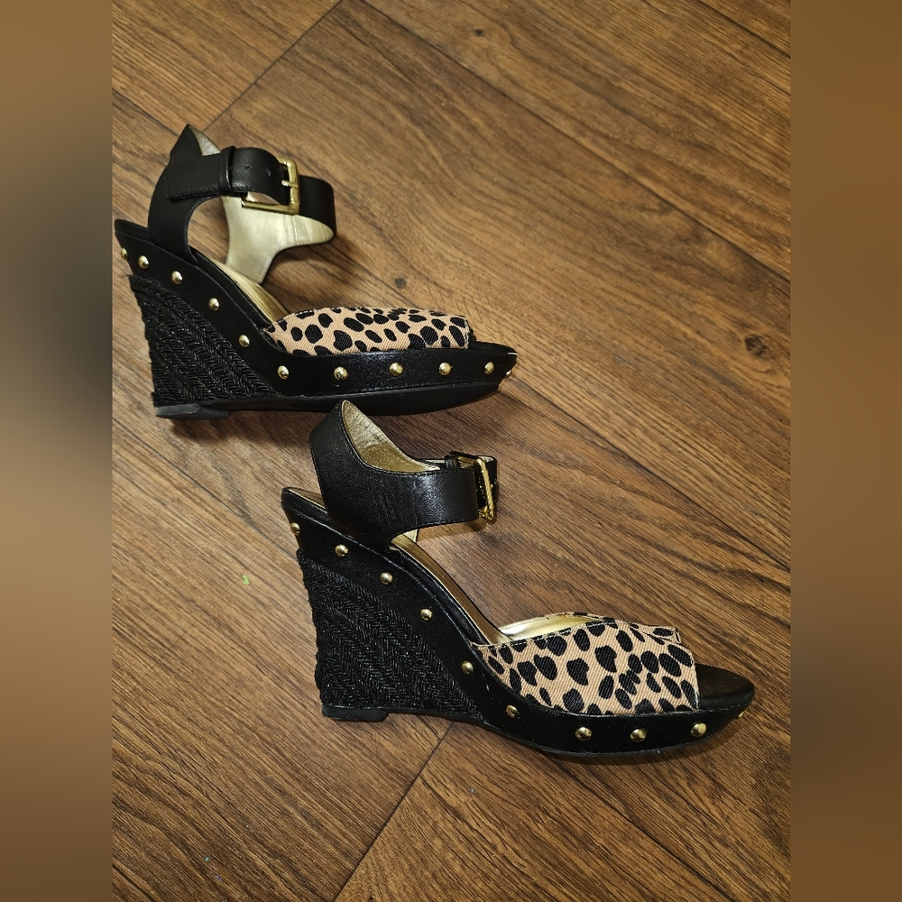 GUESS Wedge leopard ankle strap sandals with brass studs. Get your sexy on !